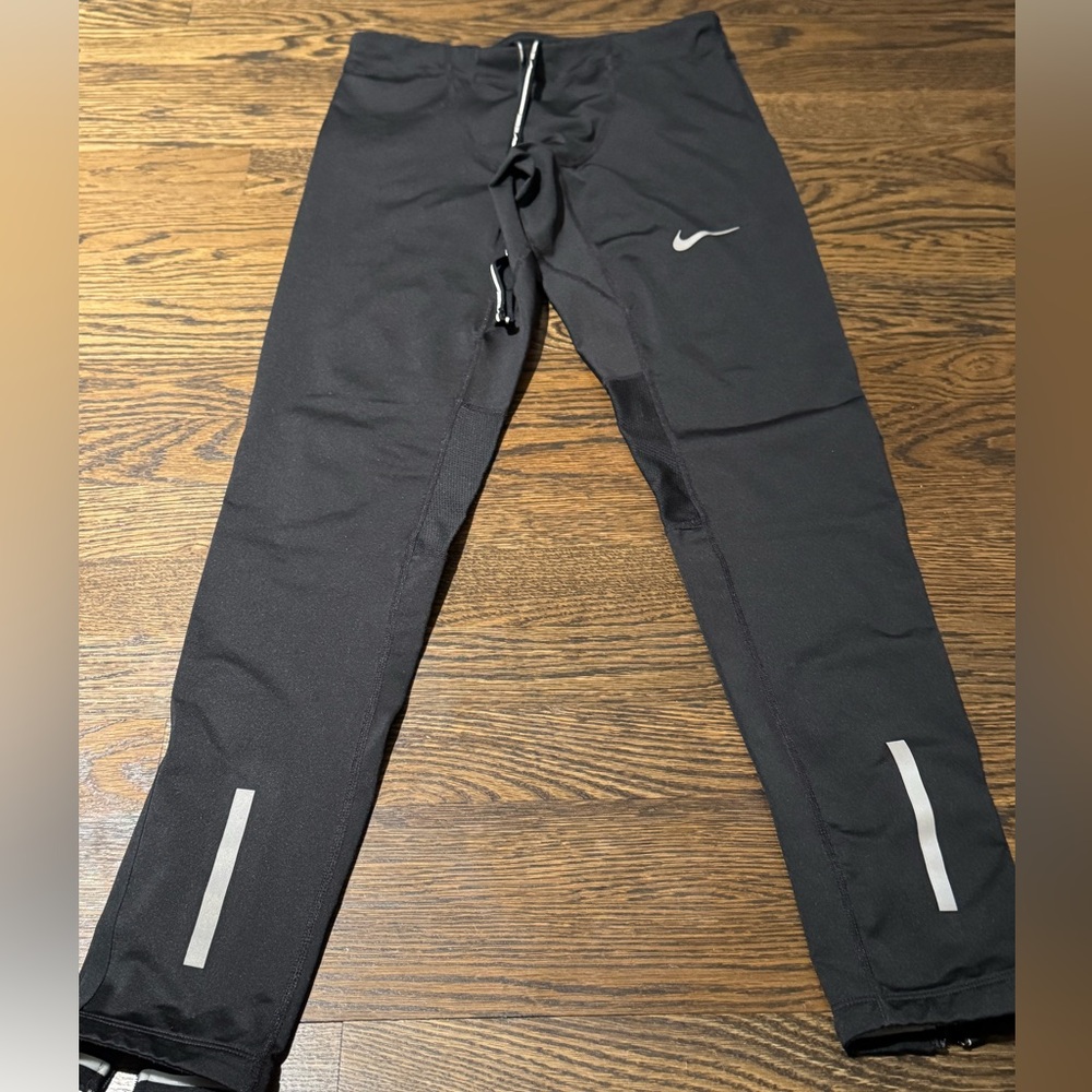 Men’s Nike Dri-fit ankle zip running pants. Size Small.
